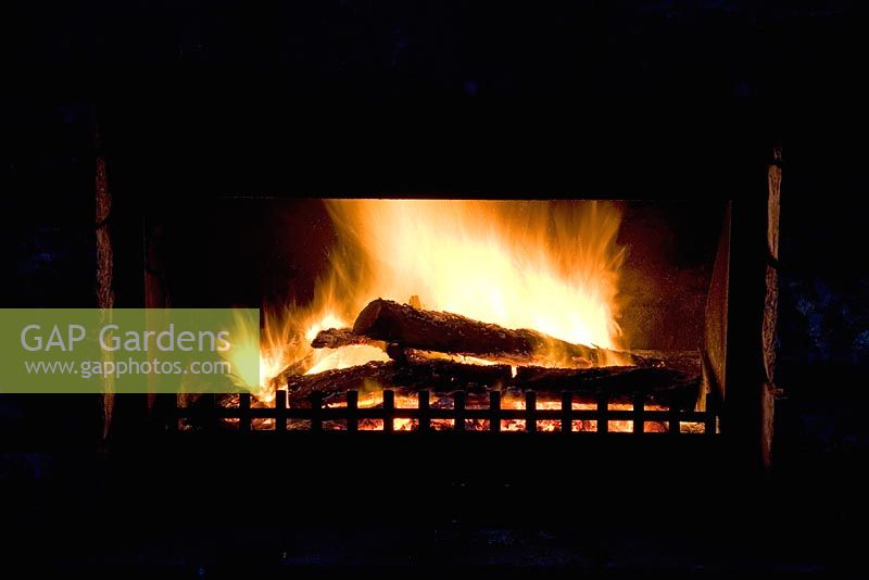 Wood-burning open fireplace. New Zealand
