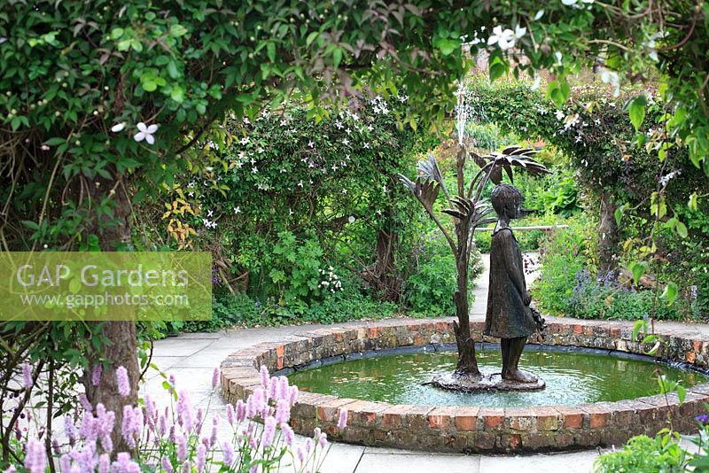 Water feature of a girl - Burton Agnes Hall Walled Garden, North Yorkshire