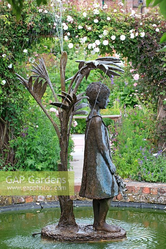 Water feature of a girl - Burton Agnes Hall Walled Garden, North Yorkshire
