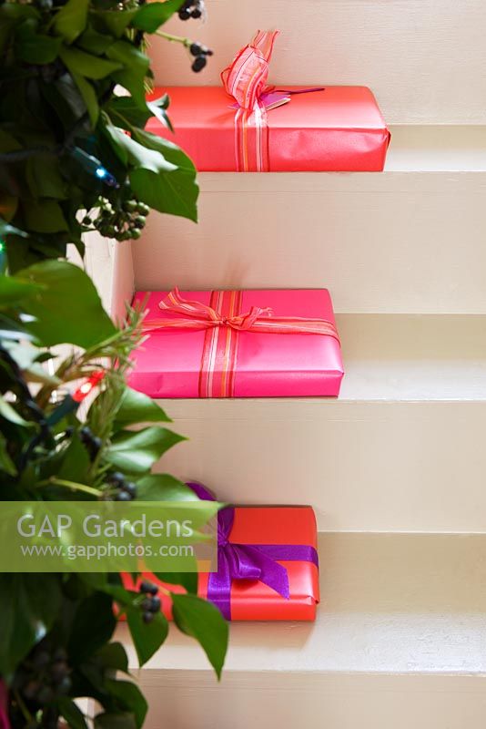 Christmas presents placed on stairs