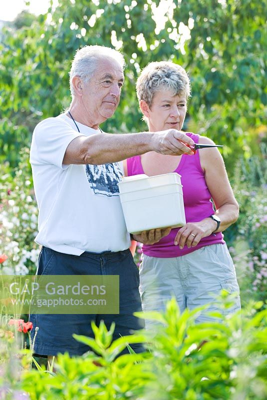 Robert and Diane Cole in the garden - Meadow Farm, Worcestershire 
