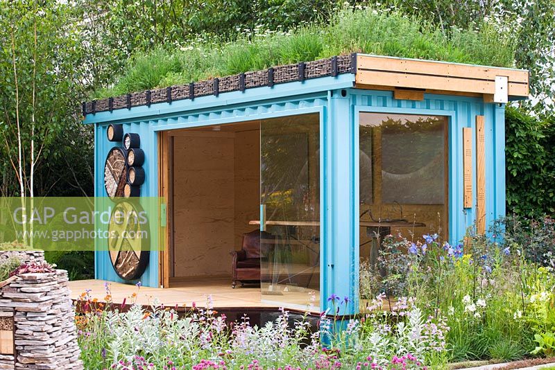 Turquoise painted garden office with 'living roof' made from a refurbished shipping container - 'The Royal Bank of Canada with the RBC New Wild Garden' - Silver Gilt Medal Winner, RHS Chelsea Flower Show 2011
 
