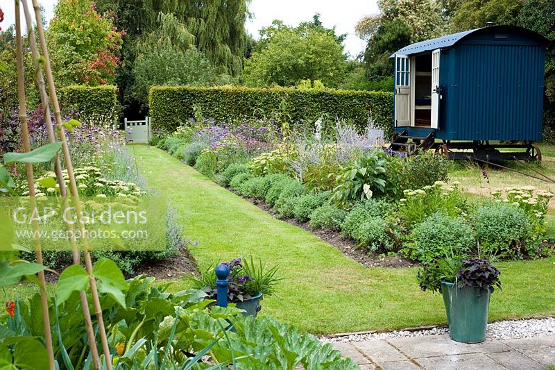 Late summer borders with Shephards hut - Woodpeckers, Essex NGS