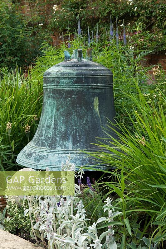 Large bell in border surrounded by Stachys byzantina - Mannington Hall, Norfolk, UK