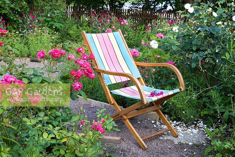 Garden chair in the Rothoffska colony built in 1903. The cabin is now a museum allotment plot. Organic garden combines old heritage plants with new varieties - Sweden