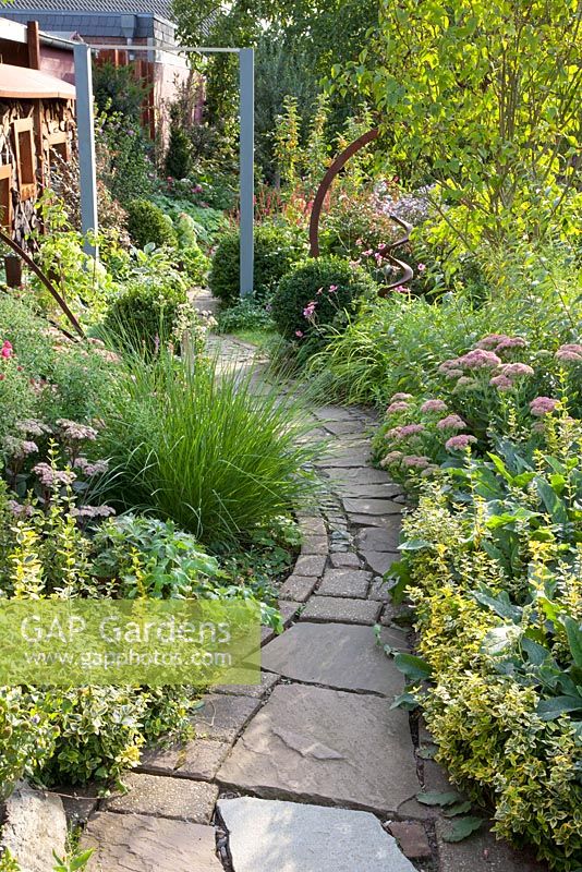 Path running through small garden - Marx Garden