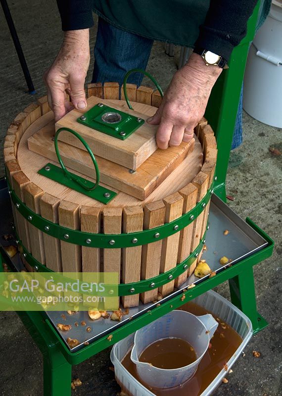 Making Apple Juice - Press lid and blocks being placed in position