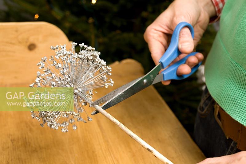 Making homemade Christmas tree decorations with sprayed seedheads