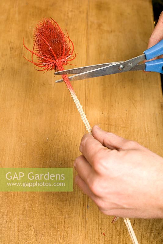 Making homemade Christmas tree decorations with sprayed seedheads