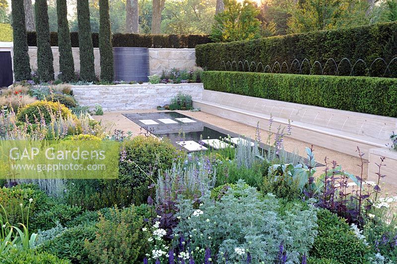 Italian style sunken garden. The Arthritis Research UK Garden. Chelsea Flower show 2012