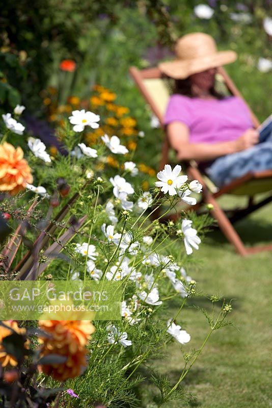 Woman relaxing in garden