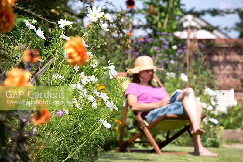Woman relaxing in garden