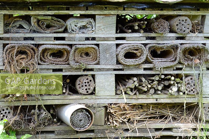 Large bug hotel made from old pallets and other recycled items