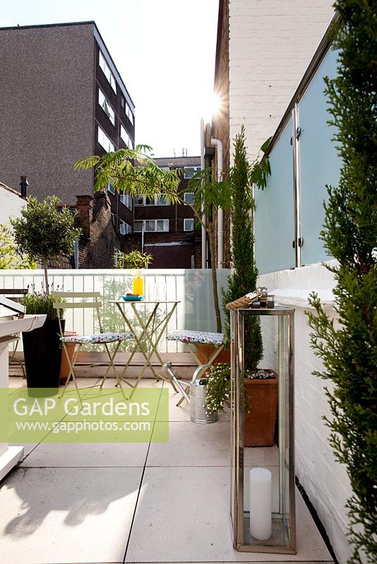 Small London garden with table and chairs
