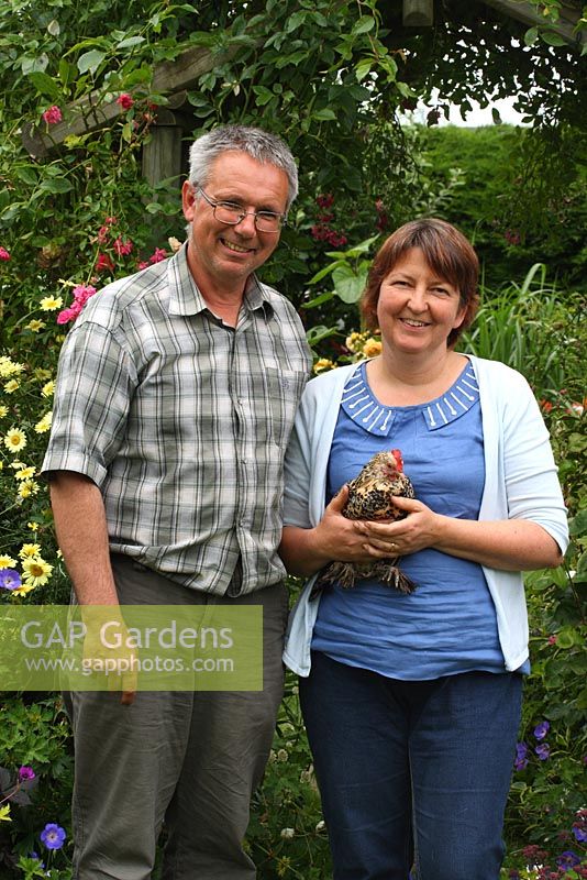 Barry and Mandy Milton with 'Lady Clarice', a Lemon Millefleur Booted Bantam - The Lizard, Wymondham, Norfolk