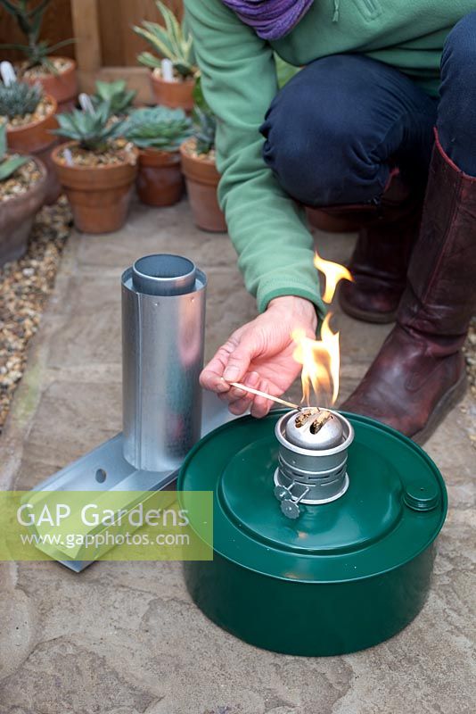 Assembling and lighting greenhouse heater