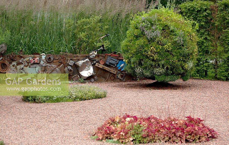 Fence of recycled carparts. Conceptual garden showing unique physiographic feature of Suncheon Bay.