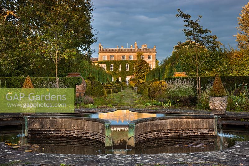 Lilly Pool, Thyme Walk and South Front of Highgrove House, September 2012. The house was built between 1796 and 1798 in a Georgian neo classical design. 