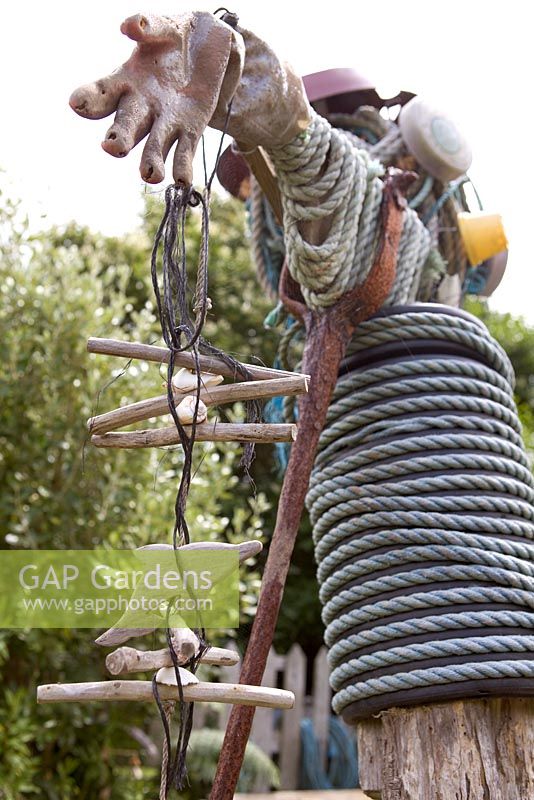 Scarecrow made from recycled coastal objects - Coastal allotment, Mousehole, Cornwall