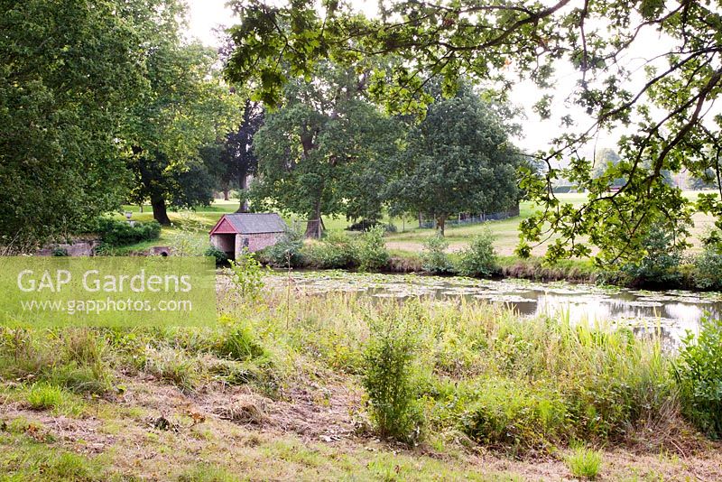 View of Boat House overlooking the lake in September - Parham, West Sussex