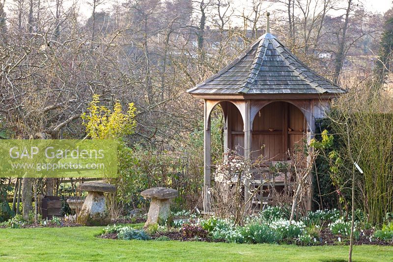 Rustic gazebo and bed of Galanthus - Dial Park