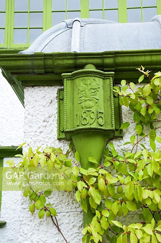 Exterior wood and metalwork on the house, dated 1895, are all painted in 'Voysey Green'. Perrycroft, Upper Colwall, Herefordshire, UK