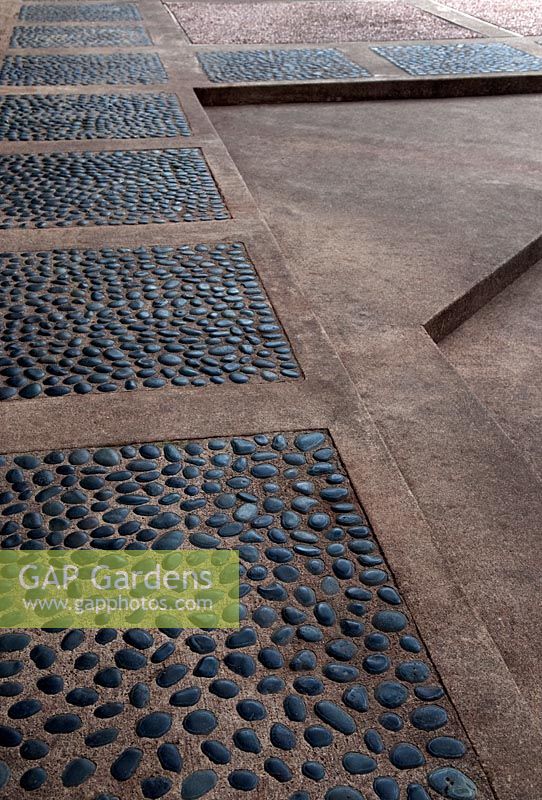Inlaid pebbles in walkway. Japanese Garden, Fort Worth Botanical Garden, Texas, USA 
