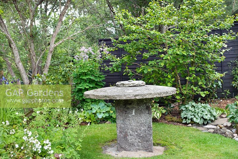 Old millstone used as a table