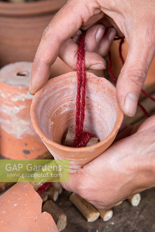 Step by step -  Making a decoration from small terracotta pots to hang inside hazel wigwam