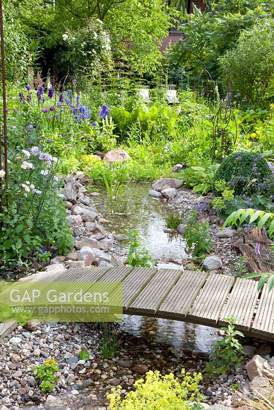 Wooden bridge over stream