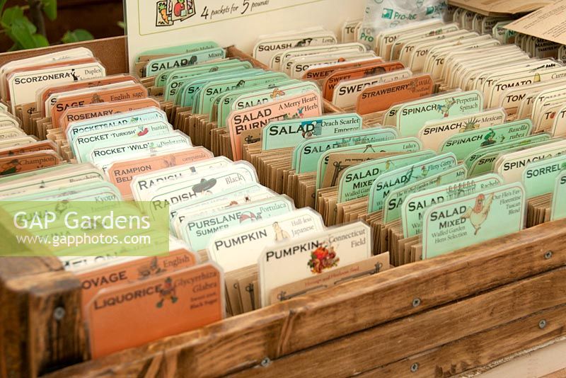 Seed bags filed in old wooden box 