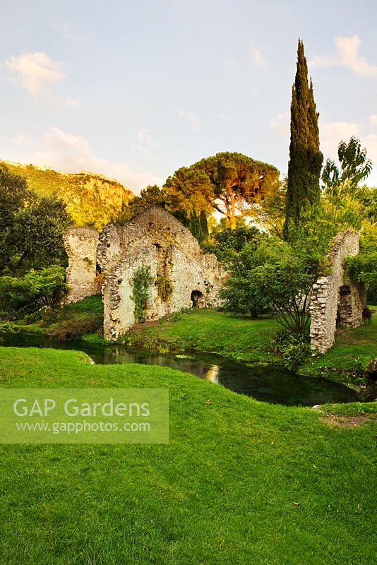 Ninfa garden, Giardini di Ninfa, Italy - Ruin and river