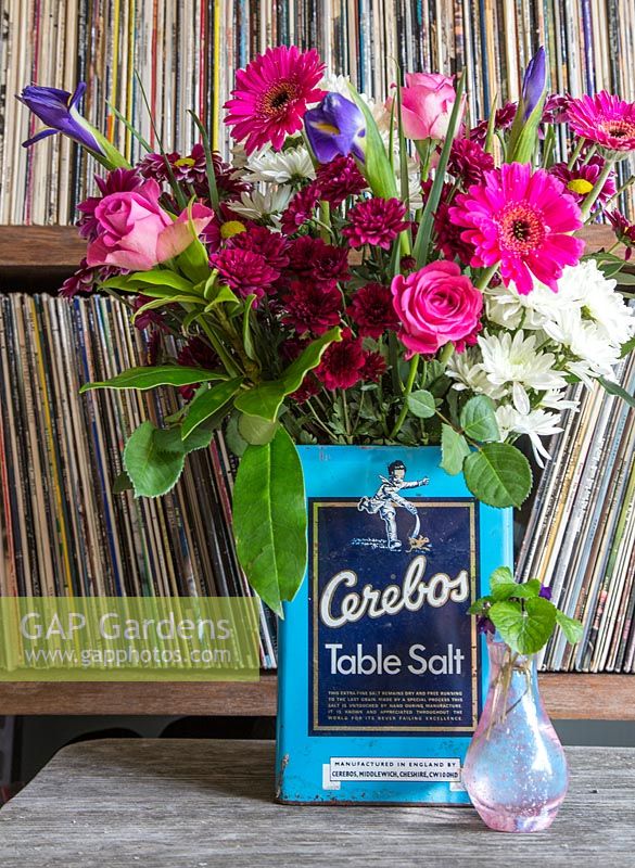 Floral arrangement in an old salt can