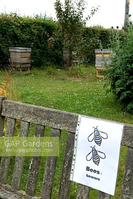 Sign warning garden visitors about the presence of bees - Open Gardens Day 2013, Brundish, Suffolk 