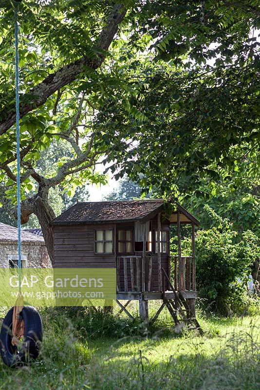 Wooden tree house or wendy house at Chateau Rigaud, Bordeaux, France