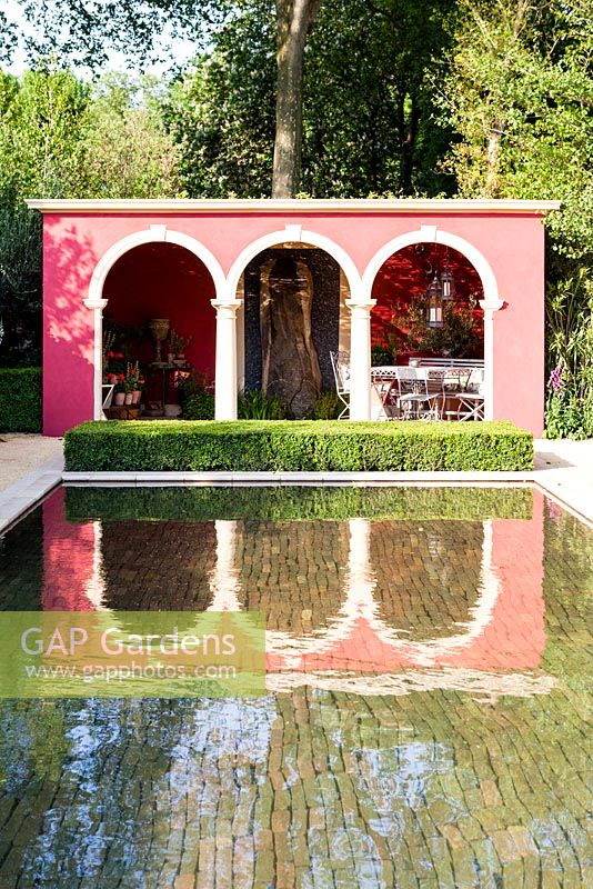 The pavilion at the end of the pool, with low clippped formal hedge of box - The Brand Alley Renaissance Garden2014 RHS  Chelsea Flower Show garden awarded Bronze Medal