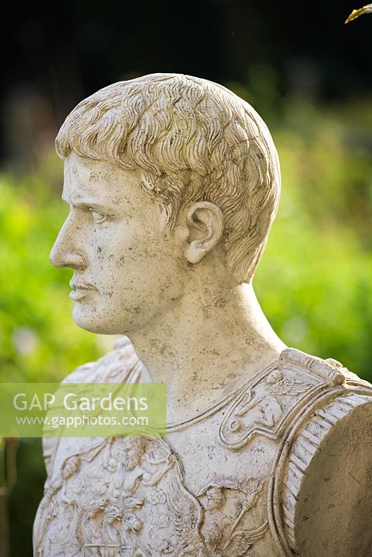 Bust of Julius Caesar next to the exedra. Painswick Rococo Garden, Gloucestershire 