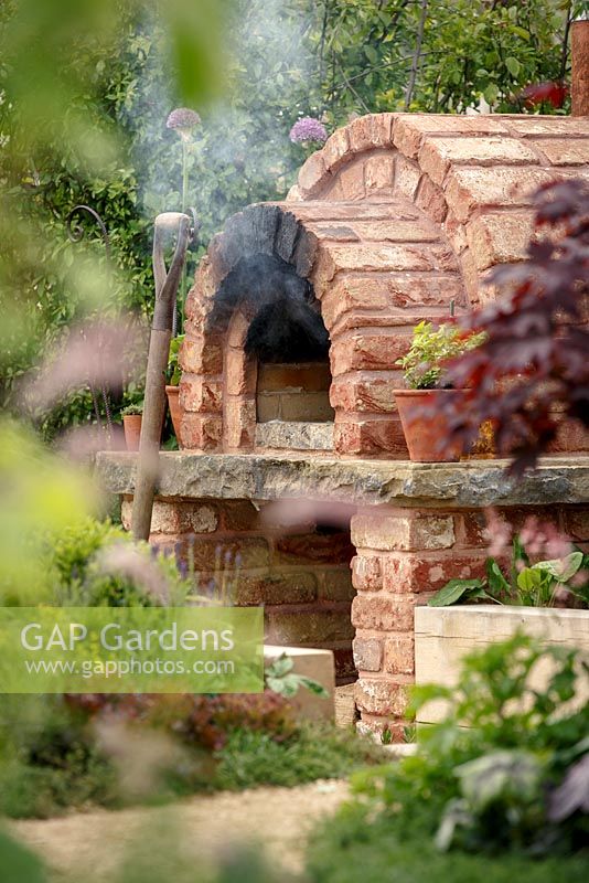 Smoking brick pizza oven, 'A Fruity Story', show garden, RHS Malvern Spring Festival 2014