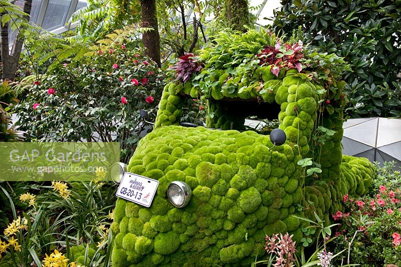 A moss covered delivery truck in Cloud Forest, Gardens by the Bay, Singapore