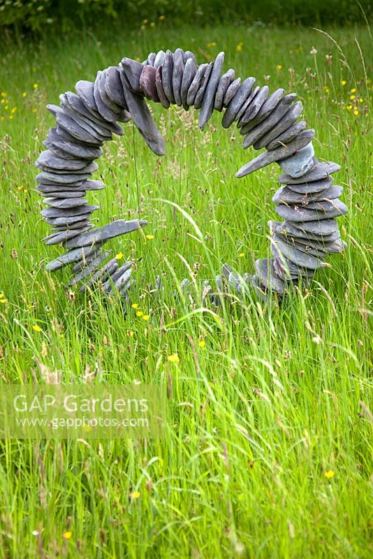 Stone sculpture in the meadow