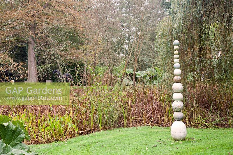 Visitor II by Fiamma Montagu. The Hannah Peschar Sculpture Garden designed by Anthony Paul, landscape designer