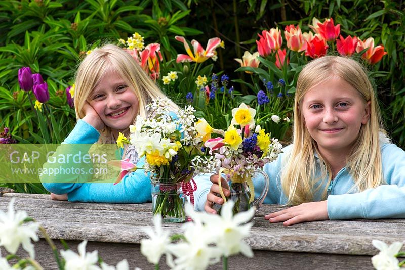 Mother's day posie in April. Two sisters have picked fresh flowers, and created these posies for their Mum.