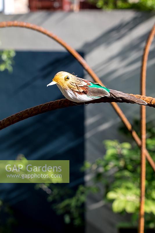 Decorative bird on builders rod