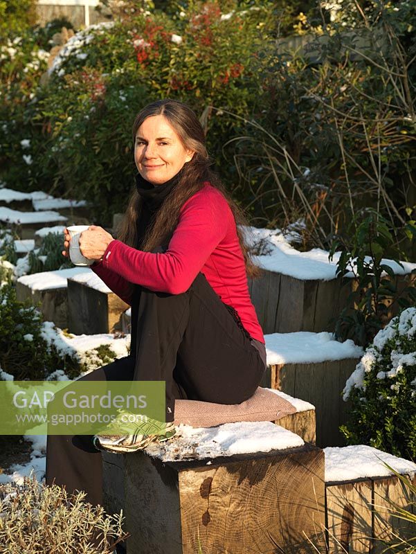 Garden photographer Nicola Tomkins enjoying the winter sunshine in her Thames side garden.