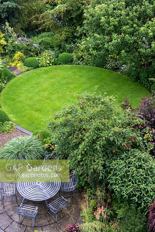 An overhead view of Windy Ridge garden which is laid out with circular lawn and patio.