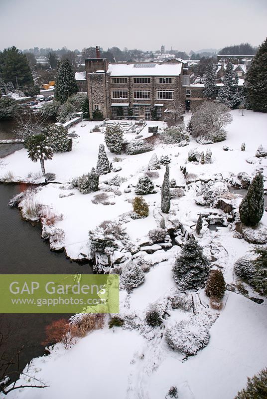 View of Kilver Court garden in Somerset from the viaduct, covered in snow