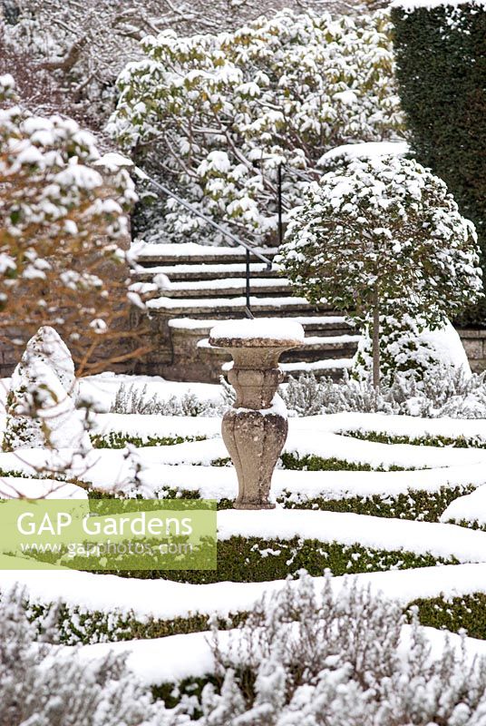 Snow covered parterre with sundial - Kilver Court, Someset