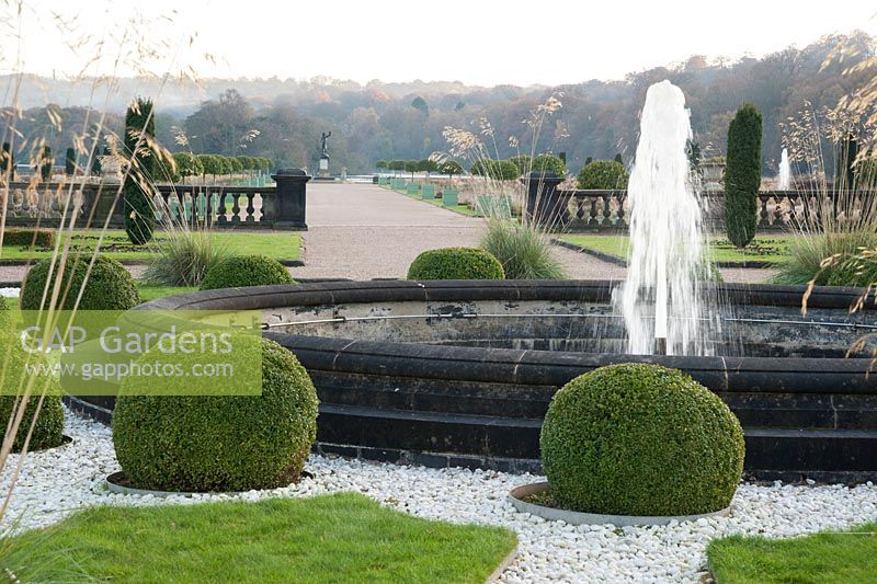 Fountain in the Upper Flower Garden, surrounded by clipped box spheres. Trentham Gardens