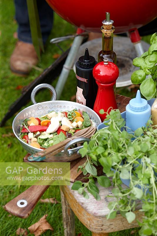 Summer salad on garden table 