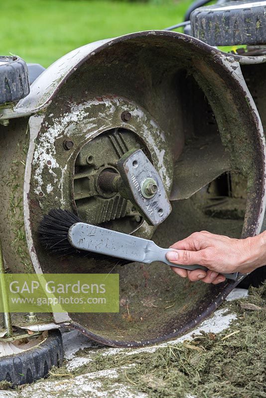 Use a brush to clean off any excess dirt or grass left behind